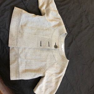 A black cropped short sleeve coat